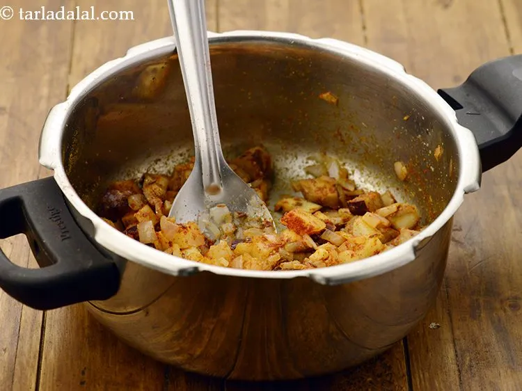 Step 20 – Saut&eacute; the spices and veggies on a medium flame for 1 more minute.