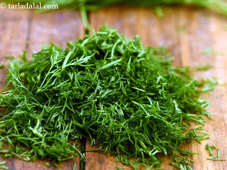 स्टेप 24 – १/४ कप&nbsp;<a href=""https://www.tarladalal.com/glossary-dill-leaves-shepu-suva-bhaji-hindi-376i"">डिल के पत्ते (शेपू / सुवा भाजी)</a>&nbsp;डालें।&nbsp;