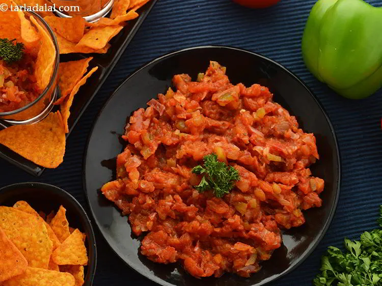 Step 31 – Add 1/4 cup&nbsp;<a href="https://www.tarladalal.com/salsa-836r">salsa</a>.