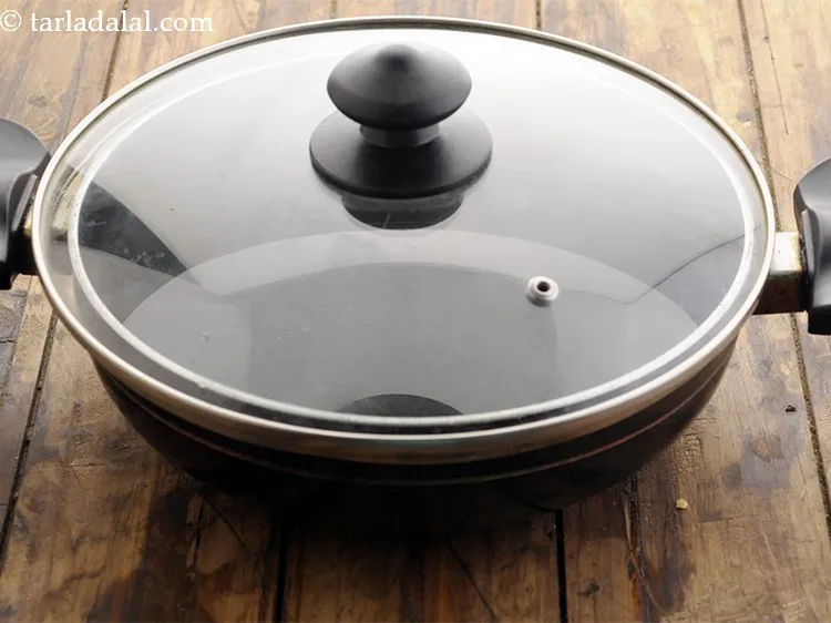 Step 9 – Cover with a lid and keep aside to cool for about 30 minutes.&nbsp;