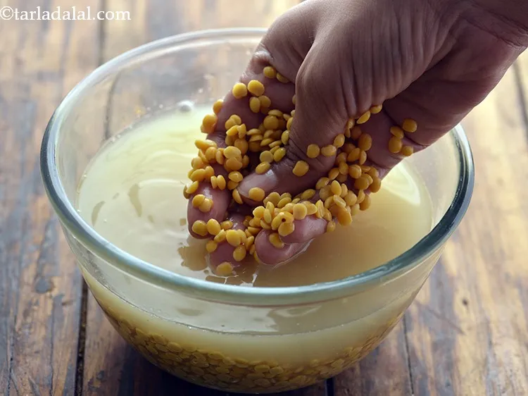 Step 34 – Wash the toovar dal thoroughly in a bowl full of water or under running water. …