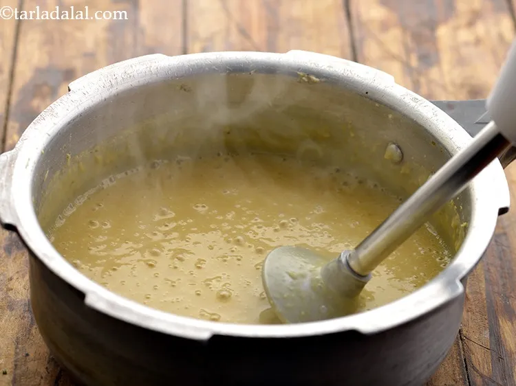 Step 39 – Blend the dal using a hand blender till it is smooth and keep aside. Alternatively, …