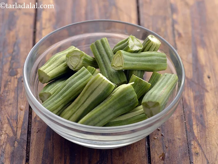 Step 40 – This is how you need to cut drumstick for<strong>&nbsp;Sambar.</strong>