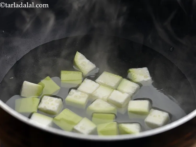 Step 42 – Add bottle gourd to the water.