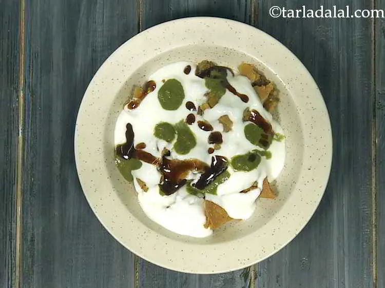 Step 12 – Now drizzle 2 tsp of sweet chutney evenly over it. Add more or less as …