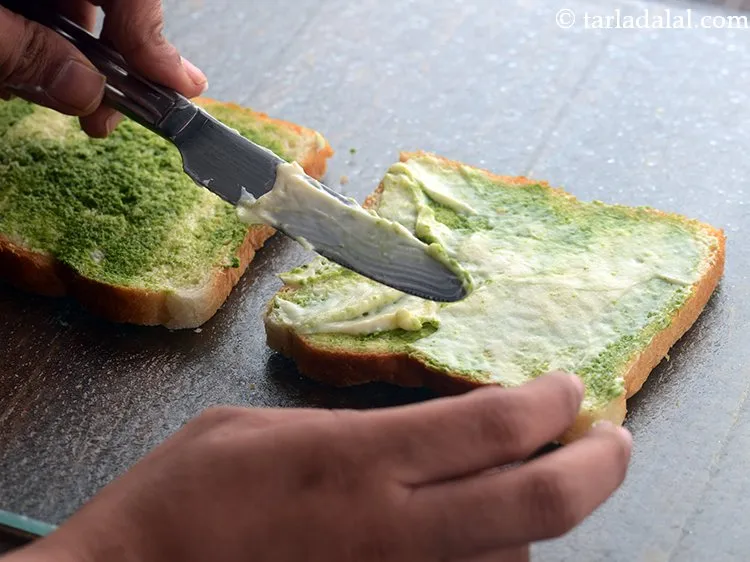 Step 13 – Apply 1 tbsp mayonnaise on one buttered-chutney bread slice.&nbsp;<a href="https://www.tarladalal.com/Schezwan-Mayonnaise-Dip-39814r" target="_blank">Schezwan Mayonnaise Dip</a>, <a href="https://www.tarladalal.com/Garlic-Mayonnaise-Eggless-Garlic-Mayonnaise-41912r" …