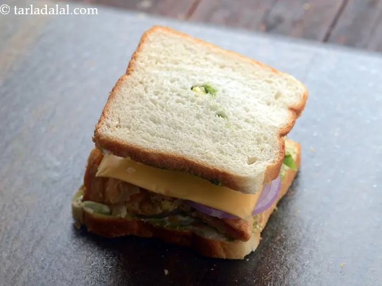Step 20 – Sandwich it using the other bread slice with the buttered-chutney side facing downwards.