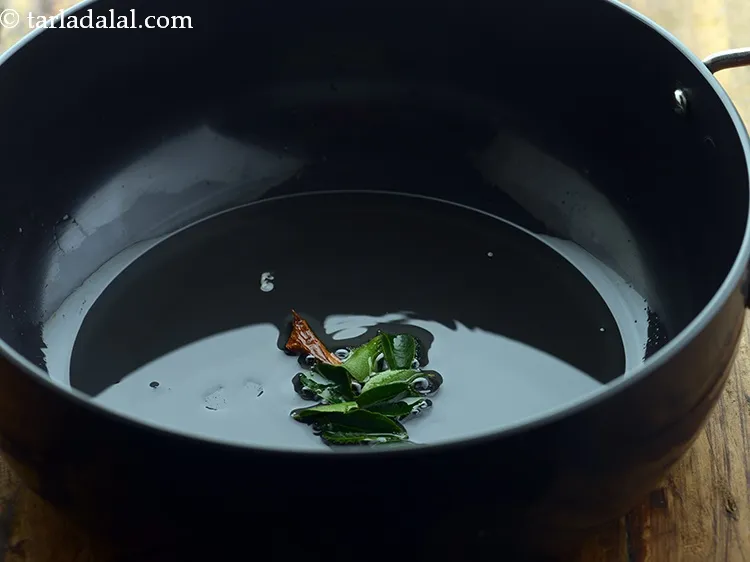 Step 9 – Add curry leaves.&nbsp;