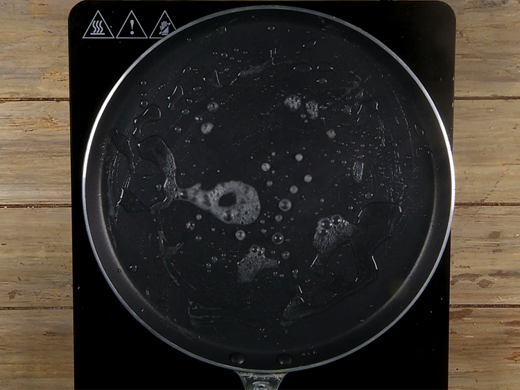 Step 3 – Sprinkle little water on the tava.&nbsp; If the water is not sprinkled, the excess fat …