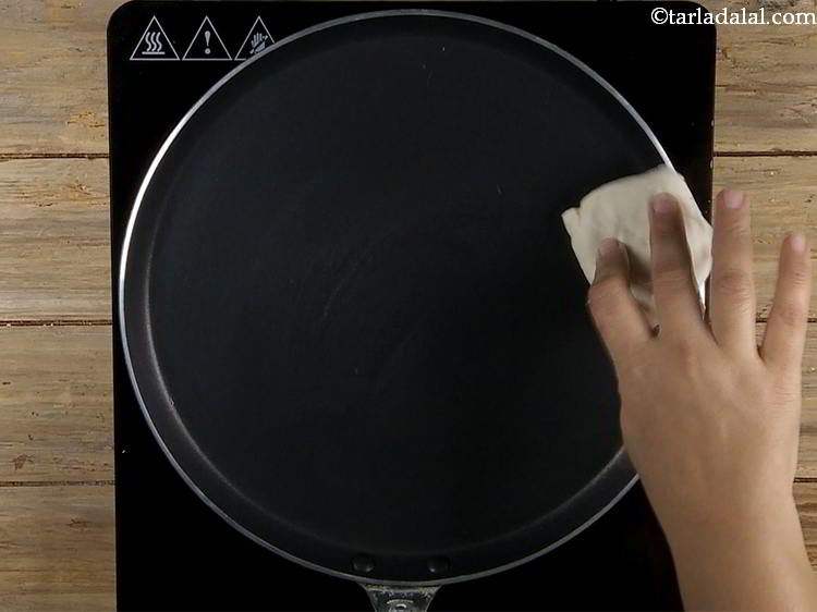 Step 4 – Wipe it using a clean muslin cloth. This is to clean and make the tava …