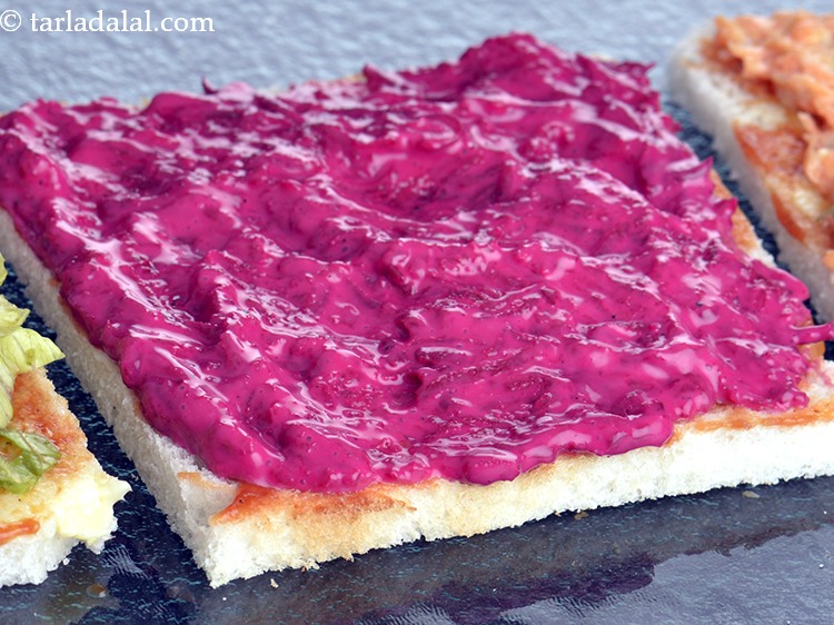 Step 43 – One the second bread slice, spread one portion of the beetroot mixture.&nbsp;
