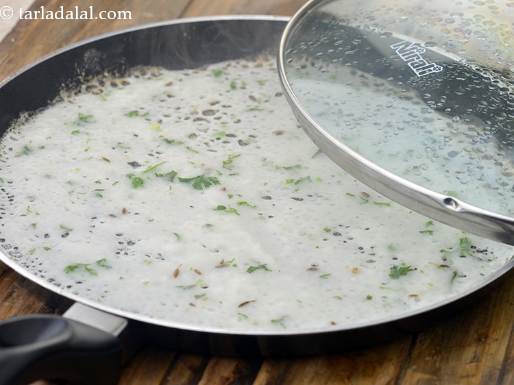 Step 30 – This dosa batter is thin and it will spread on its own by tilting the …