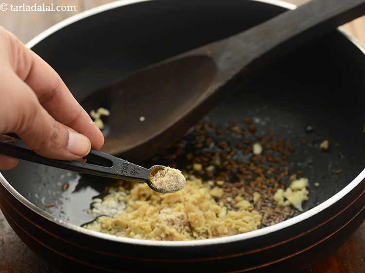 Step 21 – Add asafoetida and saut&eacute; on a medium flame for 30 seconds.