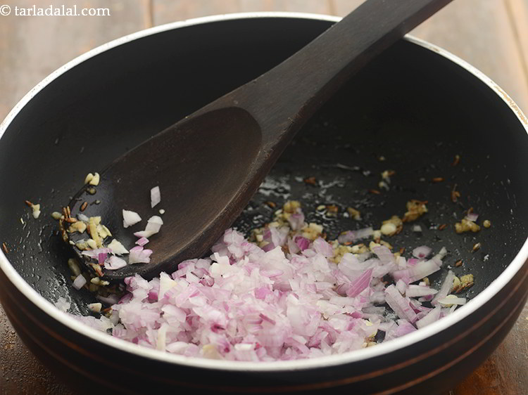 Step 22 – Add onions. To make Jain <strong>sarso ka saag</strong> simply, skip both garlic and onion from …