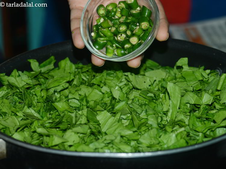 Step 9 – Also, add green chillies. Add 1 small radish and tomatoes for variation.