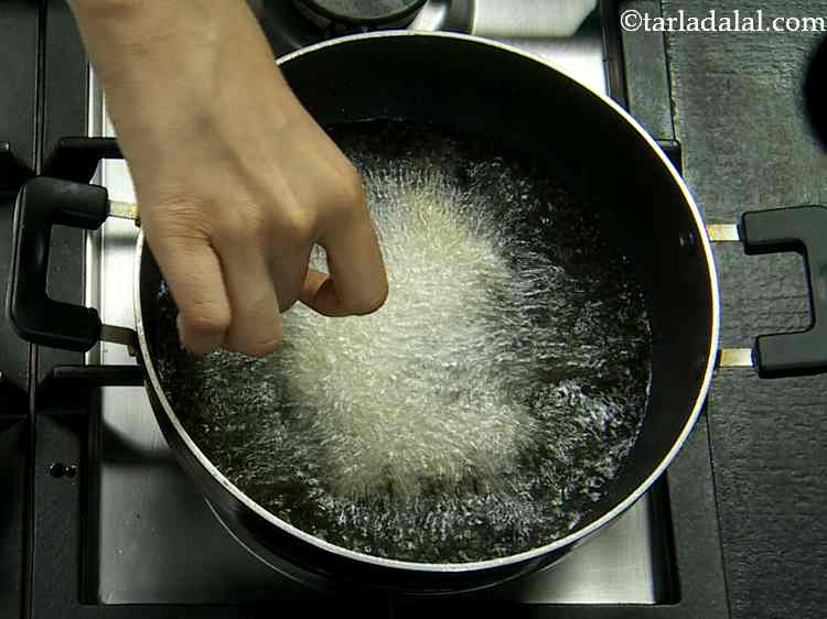 Step 12 – Heat the oil in a deep non-stick pan and check for the right temperature.&nbsp;