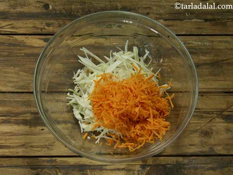 Step 2 – Add the grated carrot to the bowl.