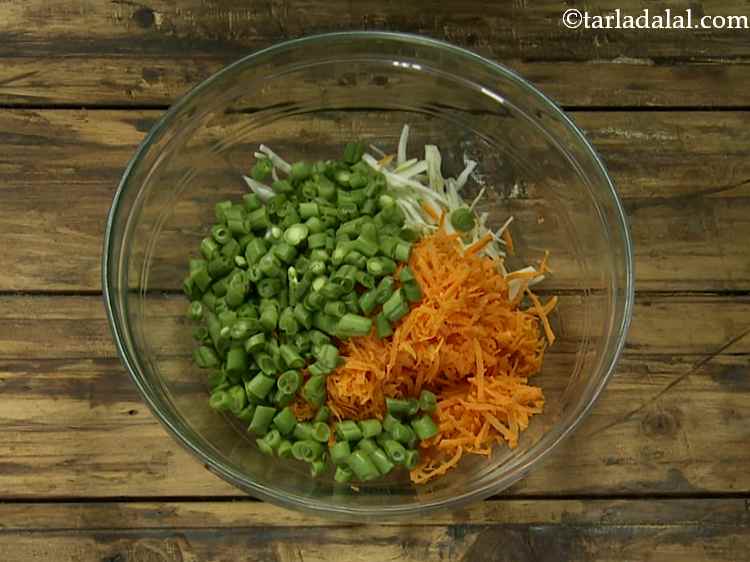 Step 3 – Also add chopped French beans to the bowl. The combination of cabbage, carrot and french …