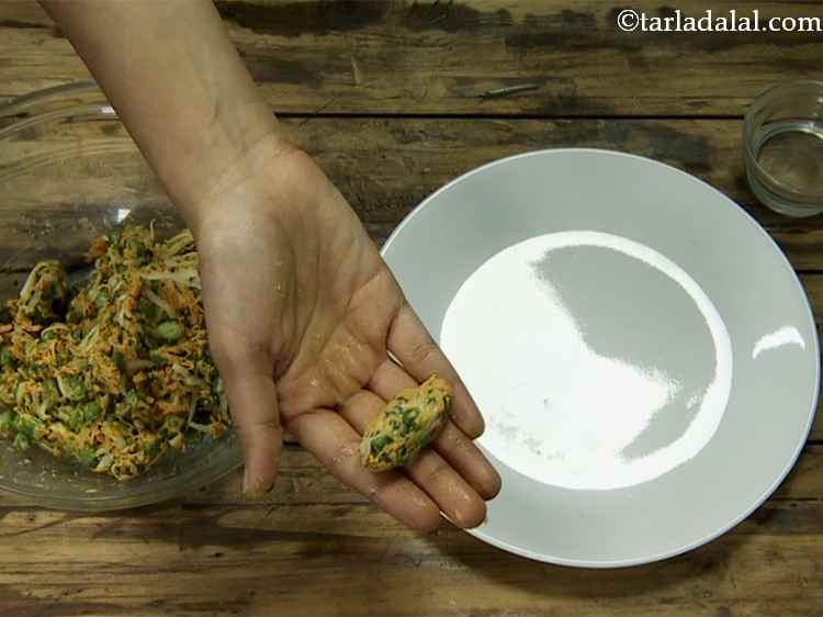 Step 10 – Take a small portion of the mixture in one hand and shape it into an …