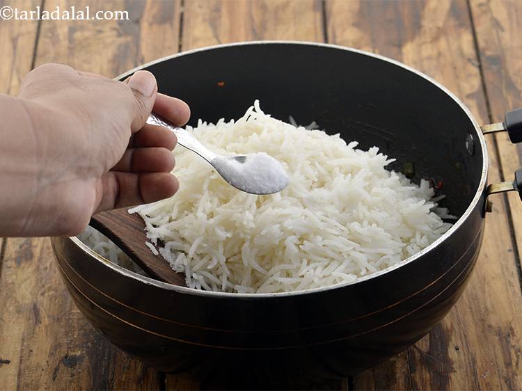 Step 27 – Add the salt and mix gently. It is very important to toss rice lightly or …