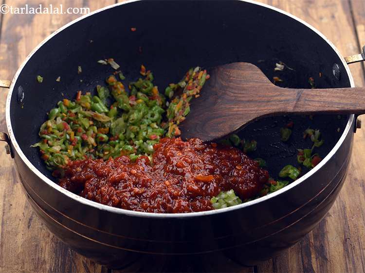 Step 22 – Add the Schezuan sauce, learn <a href="https://www.tarladalal.com/Schezuan-Sauce-32640r">how to make Schezuan sauce at home</a>.You can keep …
