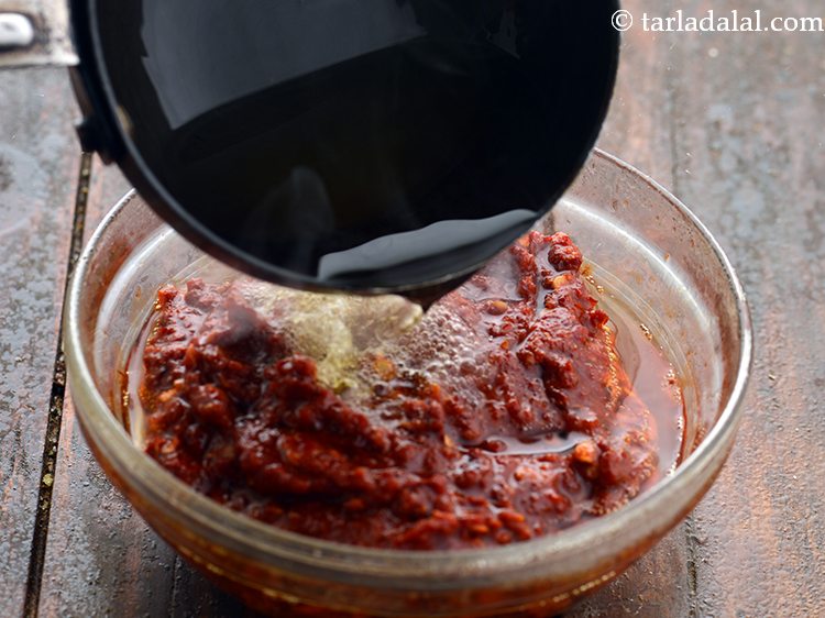 Step 13 – Pour over the chilli-garlic paste.