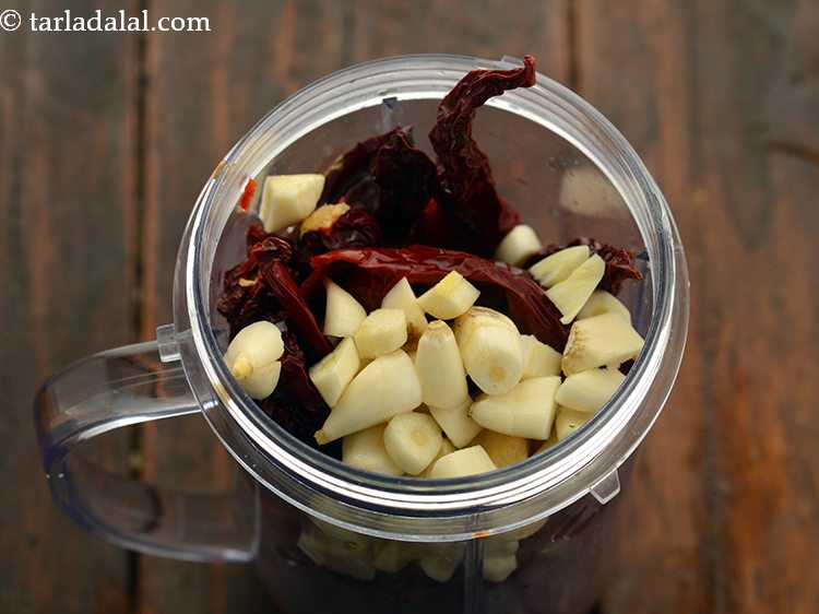 Step 6 – Add chopped garlic. Smash the garlic with the back of a knife to quickly remove …