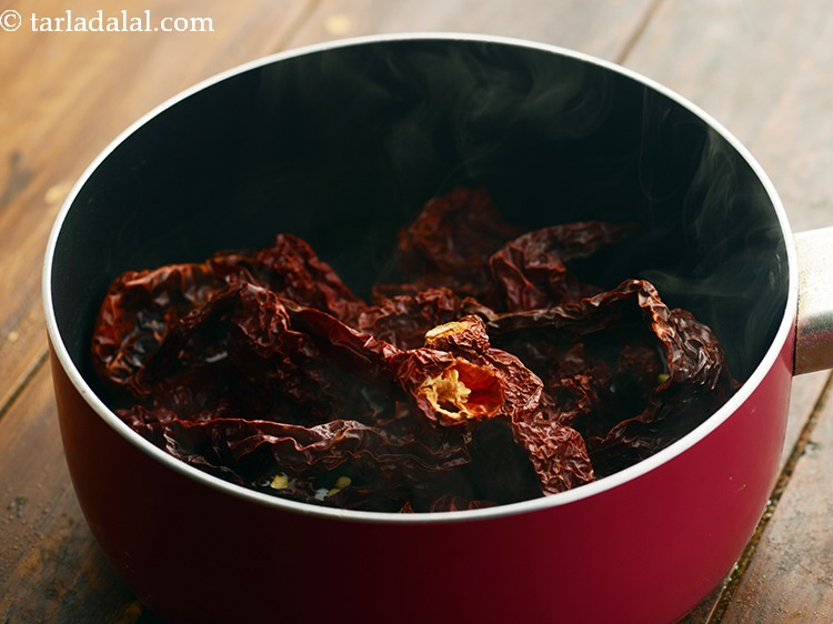 Step 5 – Add dry red chillies. We have made use of Kashmiri red chillies which provides a …