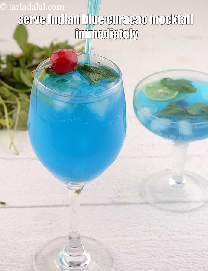 Step 12 – Serve <strong>blue lagoon mocktail recipe&nbsp;|&nbsp;Indian blue curacao mocktail&nbsp;|&nbsp;non alcoholic party drink&nbsp;|&nbsp;summer drink&nbsp;|</strong> immediately.&nbsp;
