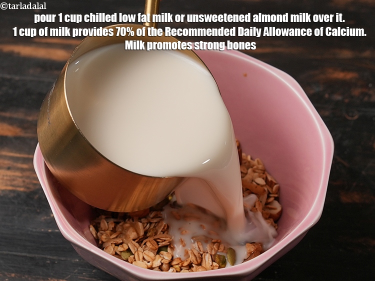 Step 30 – <meta charset="UTF-8" />Pour 1&nbsp;cup&nbsp;<strong>chilled</strong>&nbsp;low fat&nbsp;milk or unsweetened almond milk&nbsp;over the muesli.&nbsp;1 cup of&nbsp;<a href="https://www.tarladalal.com/recipes-using-milk-514">milk</a>&nbsp;provides 70% …