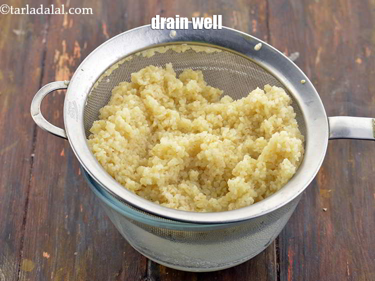 Step 8 – <meta charset="UTF-8" />Drain the broken wheat, discard the water and keep aside.&nbsp;