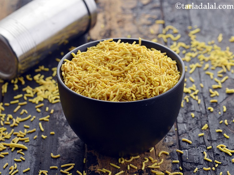 Step 36 – Finally top it with 1 tsp of <a href="https://www.tarladalal.com/sev-2791r">sev</a>.