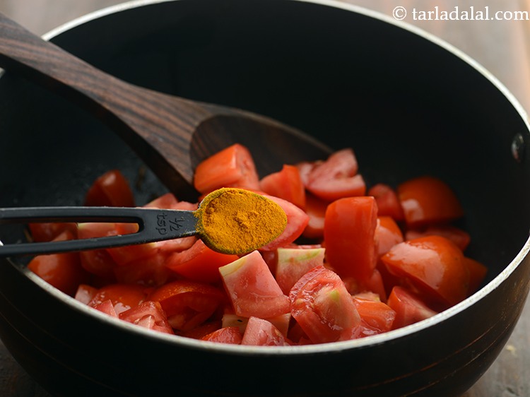 Step 7 – Add turmeric powder.