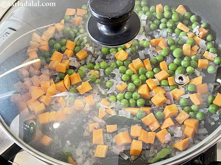 Step 17 – Cover with a lid and cook on medium flame for 4 minutes, while stirring occasionally.