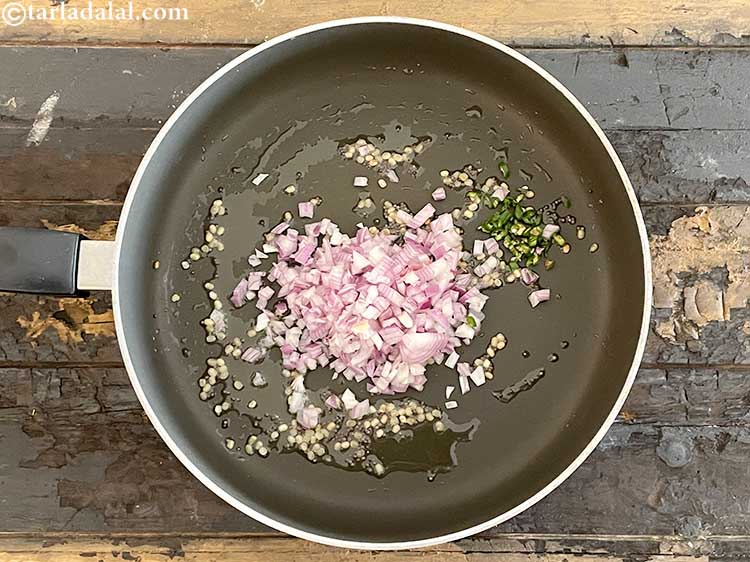 Step 10 – Add&nbsp;<meta charset="UTF-8" />1 tsp&nbsp;finely&nbsp;<a href="glossary-chopped-green-chilli-820i">chopped green chillies</a>. If you like your upma slighlty spicy then …