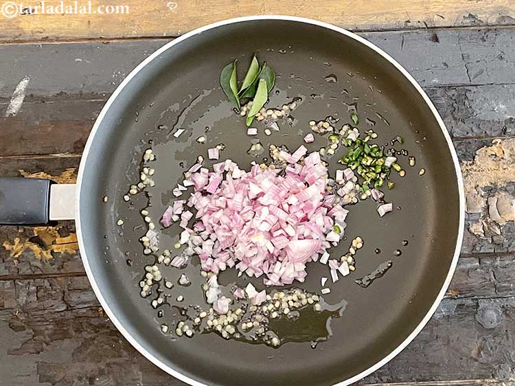 Step 11 – Add&nbsp;<meta charset="UTF-8" />4&nbsp;<a href="glossary-curry-leaves-kadi-patta-kadipatta-388i">curry leaves (kadi patta)</a>.