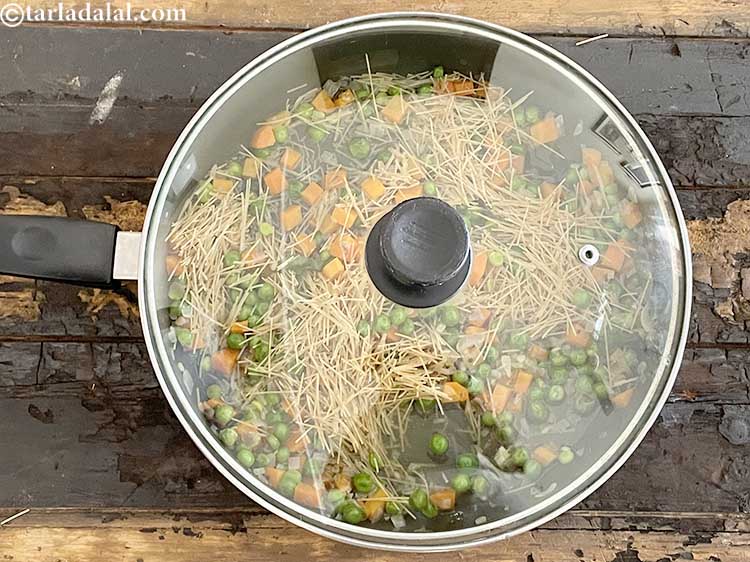 Step 23 – Cover with a lid and cook on medium flame for another 6 minutes, while stirring …