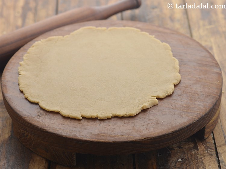 Step 14 – Take a portion and cover the other to prevent from drying. Roll out a portion …