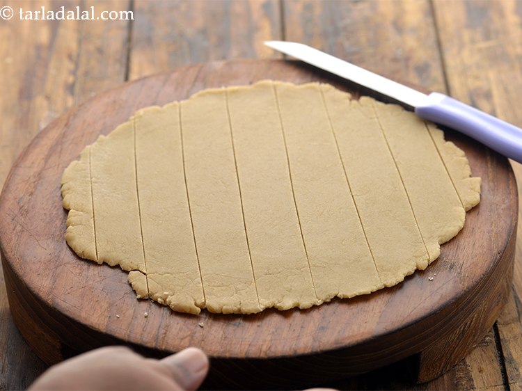 Step 15 – First, cut them vertically into &frac12; to 0.75 inch thick strips using a sharp knife …