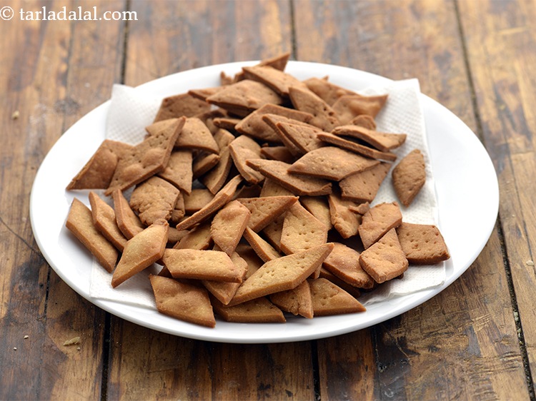 Step 23 – Drain the <strong>shakkar pare</strong> on an absorbent paper. If you are health conscious then you …