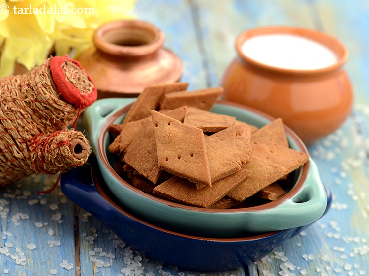 Step 25 – Cool the <strong>sweet shakarpare</strong> completely and store in an air-tight container.