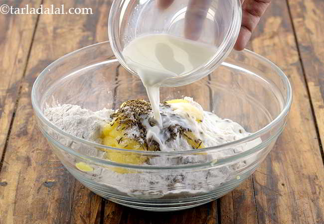 Step 24 – Now add the milk to the dough.