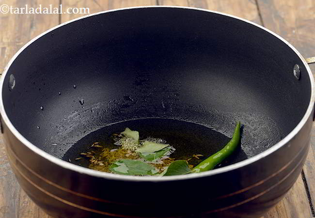 Step 10 – Now add the curry leaves.