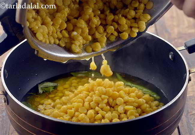 Step 12 – Now add the cooked chana dal to the masala mixture.