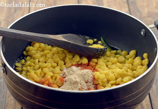 Step 14 – Also, add a little amchur powder for a zingy taste.