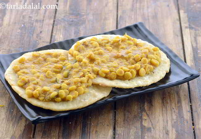 Step 38 – Spread one portion of the dal evenly over it.