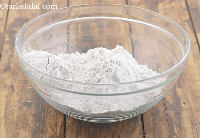 Step 20 – Take a deep bowl and add the plain flour to it. We have used 2 …