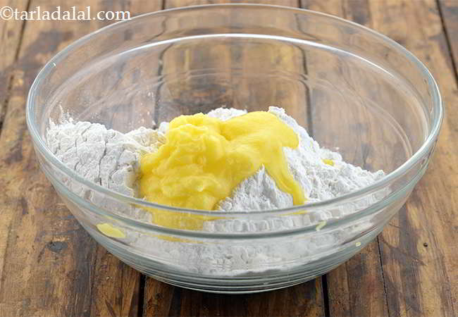 Step 21 – To it, add the ghee. Adding any fat content to dough makes the dough softer …