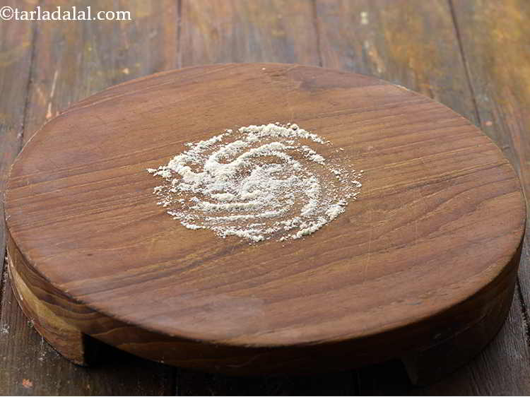 Step 17 – Dust the rolling surface with a little whole wheat flour.