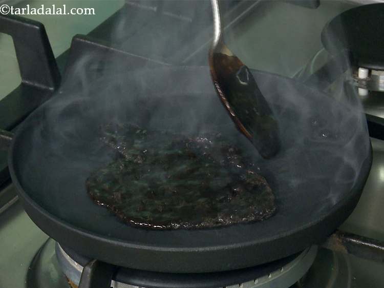 Step 20 – Once the plate is hot , pour 2 tbsp of the prepared chocolate sauce evenly …